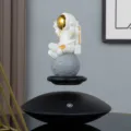 Magnetische levitatie astronaut ornament, zwevende maan decoratie voor thuis bureau. - UFO zwevende astronaut ornament