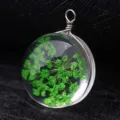 Forest style round glass pendant featuring green dried flowers and silver wire wrap - Silver Wire (P2024) / 15mm Diameter / Green