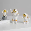 Tableau des tailles détaillé pour ensemble de figurines d'astronaute, décor de bureau en résine. - Grand ensemble de 3 pièces doré exquis
