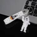 Cute astronaut keychain pendant for keys, stylish backpack charm and birthday gift. - Style A with Strap / Silver