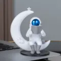 Mignonne figurine d'astronaute sur la lune avec livre, décoration de bureau créative. - Modèle C n° 12 (masque bleu électroplaqué)