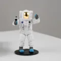 Cute astronaut car dashboard ornament figurine with removable helmet and detailed spacesuit. - Astronaut + Camera