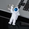 Cute astronaut keychain with electroplated blue visor metal ring creative cartoon bag pendant gift - Style A with Buckle / Blue