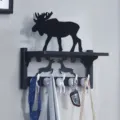 Estante de pared nórdico con diseño de ciervo decorativo y ganchos de cola de animal para el hogar. - Estante blanco y negro + Alce negro