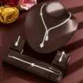 Detailed view of silver crystal heart jewelry set with necklace earrings and bracelet - HB1820 Set / Silver