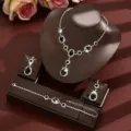 Elegant European style bridal jewelry set featuring black teardrop necklace, earrings and bracelet. - Two-Piece Set / Black