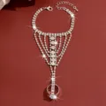 Detailed view of the sparkling rhinestone hand chain, featuring intricate layered tassel design. - Hb1001 / Silver