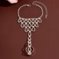 Exquisite rhinestone hand chain jewelry, stunning hollow crystal slave bracelet detail shot. - HB998 / Silver