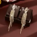 Exquisite rhinestone long tassel earrings, sparkling crystal fringe design for party wear. - Gold