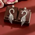 Elegant rhinestone swan tassel earrings with sparkling crystals for women luxury fashion gift - Silver