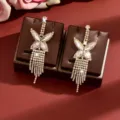 Elegant crystal butterfly tassel earrings sparkling rhinestone jewelry for women party wear. - Gold