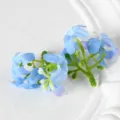 Petites têtes de fleurs artificielles bleues pour accessoires de cheveux et spectacle. - Bleu