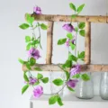 Guirnalda de vid de flores de rosas moradas artificiales para decoración de bodas - Enredadera de rosas de 9 cabezas (púrpura)