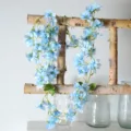 Guirnalda de flores artificiales azules de seda decoración de pared para hogar boda fiesta 1ud - Enredaderas de 135 flores de jazmín de invierno (azul)