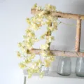 Guirnalda colgante de flores de seda artificial para decoración de pared de boda en casa. - Enredaderas de 135 flores de cerezo (champán)