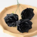 High-quality set of three artificial black roses elegantly displayed on a decorative beige tray - Black