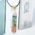 Macro detail of natural 7-chakra crushed stone pendant with copper wire wrap - 2 (With Rope)