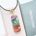 Detailed view of the chakra crystal stone resin pendant with copper wire wrap - 1 (With Rope)