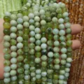 Fili di perle rotonde in pietra preziosa verde naturale per creazione gioielli DIY. - Macchiato all'Uva Verde