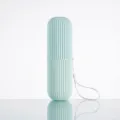Portable travel toothbrush cup mint green capsule storage box with convenient hanging lanyard. - Travel Toothbrush Cups (Nordic Green with Lanyard, OPP Packaging)