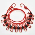 Portable travel clothesline with elastic cord and clips for outdoor hotel laundry drying - Red (With Interval Buckle)