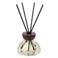 Glass reed diffuser bottle with wooden cap and black sticks for home fragrance and indoor decor. - Light Gold - White Tea