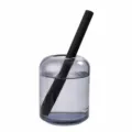 Grey glass reed diffuser bottle with black stick, minimalist home fragrance decor item sku - Light Gray
