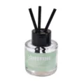 Glass reed diffuser bottle with black sticks and green label for home fragrance aromatherapy. - Green - Aromatherapy (Scent: Gardenia)