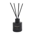 Black reed diffuser bottle detail close up view showcasing ribbed glass texture and fragrance reeds. - Single Bottle (Ebony Sandalwood)