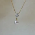 Elegant gold stainless steel necklace featuring a clear zircon and white pearl pendant - Oval Rhinestone Pearl Necklace