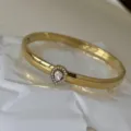 Elegante bracciale rigido in acciaio inossidabile dorato con cristallo a goccia scintillante - Bracciale a Goccia 6mm / Oro