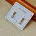 Minimalistische Vintage Gold Edelstahl Ohrringe mit Zirkonia Steinen in Tropfenform - Runde Zirkonia Ohrstecker / Transparent Tropfenform