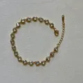 Elegant gold-tone stainless steel bracelet with clear heart-shaped cubic zircons - Heart Rhinestone / White