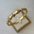 Luxuriöser 18K vergoldeter Edelstahl Armreif im Bambus-Design mit Kristallen - Flacher Bambus-Armreif Gold / 60mm Innendurchmesser