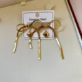 Elegante Ohrringe aus 18k vergoldetem Edelstahl mit Schleifen und Herzanhängern - Flache Schlangenkette Schleife Herz Ohrringe / Gold