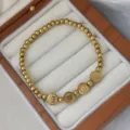 Elegantes goldenes 3mm Edelstahl Perlenarmband mit glückbringenden chinesischen Symbolen - Frieden und Freude Stil (16cm)