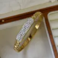 Elegant 18k gold plated stainless steel bangle featuring sparkling pavé crystal accents - Rectangular Pave Style / Gold