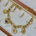 Exquisites 18K vergoldetes Edelstahl-Charm-Armband mit Sonne und bösem Blick Herz - Emaille Hamsa Böser Blick Armband