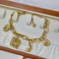 Armband aus 18 Karat vergoldetem Edelstahl mit Himmelsmotiven wie Mond und Sternen - Sonne Mond Sterne Armband