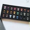 Detailed view of natural crystal mushroom miniature stone figurines set in a neat storage box. - 24 Custom Colors