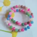 Close-up detail of candy-colored multi-color beaded bracelet, sweet style rainbow crystal jewelry. - Imitation Tourmaline