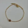 Elegant 18k gold-plated stainless steel chain with a purple crystal flower pendant. - 8mm Purple Flower Bracelet