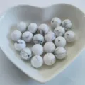 Natural white marbled round stone beads detail view, perfect for DIY jewelry making and crafting. - No Hole / White Turquoise