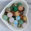 Detailed view of 12mm natural crystal agate round beads and semi-precious stone DIY jewelry parts. - Mixed Random Colors