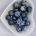 Natural blue gemstone round beads in heart bowl for DIY jewelry making and accessories. - Blue Spot Stone