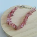 Natural strawberry quartz chip crystal bracelet with lobster clasp and extension chain variant. - Strawberry Quartz