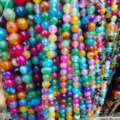 Detailed close-up of colorful striped agate beads for DIY handmade jewelry crafting. - 4mm / Mixed Color Striped Agate