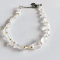 Natural irregular white crystal chip bracelet with gold spacer beads and adjustable silver chain. - White Crystal