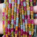 Gros plan texture detail de perles tonneau en bambou gemme coloree pour creation bijoux - Petites perles bambou 6*10,8 mm (env. 36 pcs)