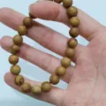 Minimalist single-circle natural stone bead bracelet, stylish daily 8mm round design. - Wood Grain